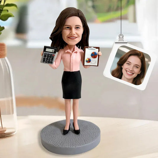 Custom female accountant bobblehead handcrafted from customer photos.webp