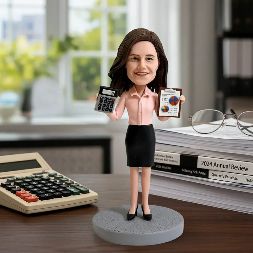 Custom female accountant bobblehead handcrafted from customer photos.webp