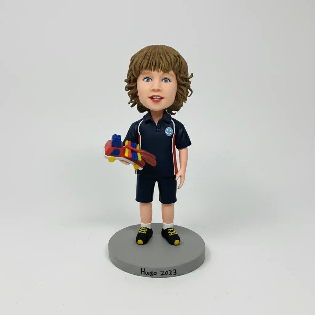 Custom boy bobblehead handmade from customer photos.webp
