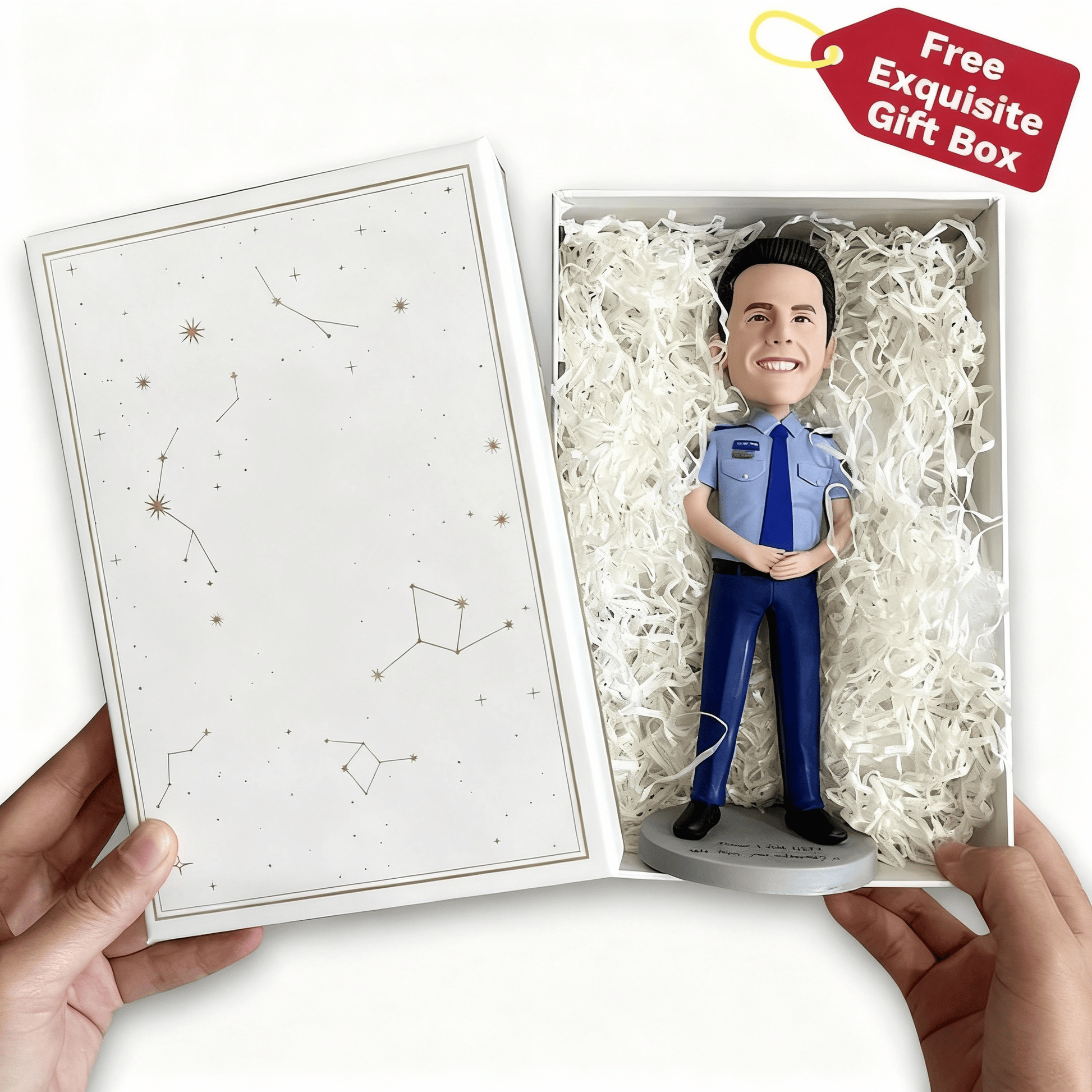 Bobblehead figure in a box with a free gift box offer