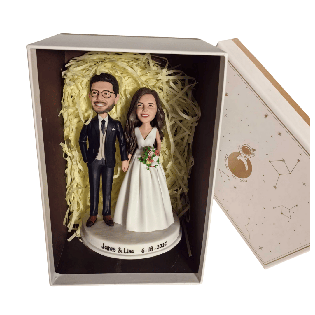Wedding cake toppers in a box with personalized text