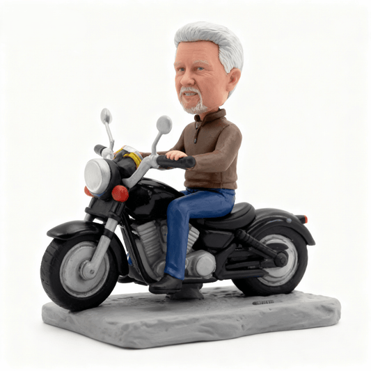 Bobblehead of a man riding a motorcycle on a white background